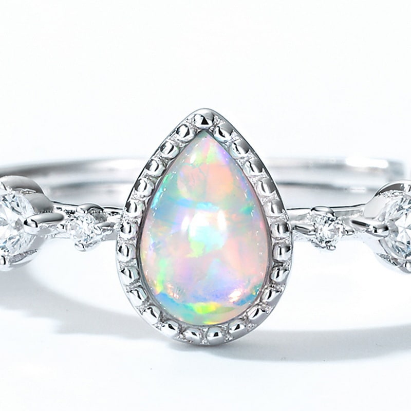 Drop shaped synthetic opal silver Ring