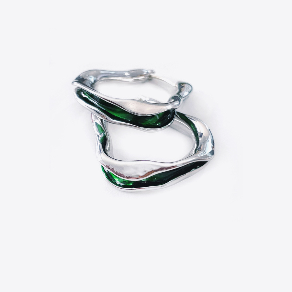 Irregular hoop silver earrings