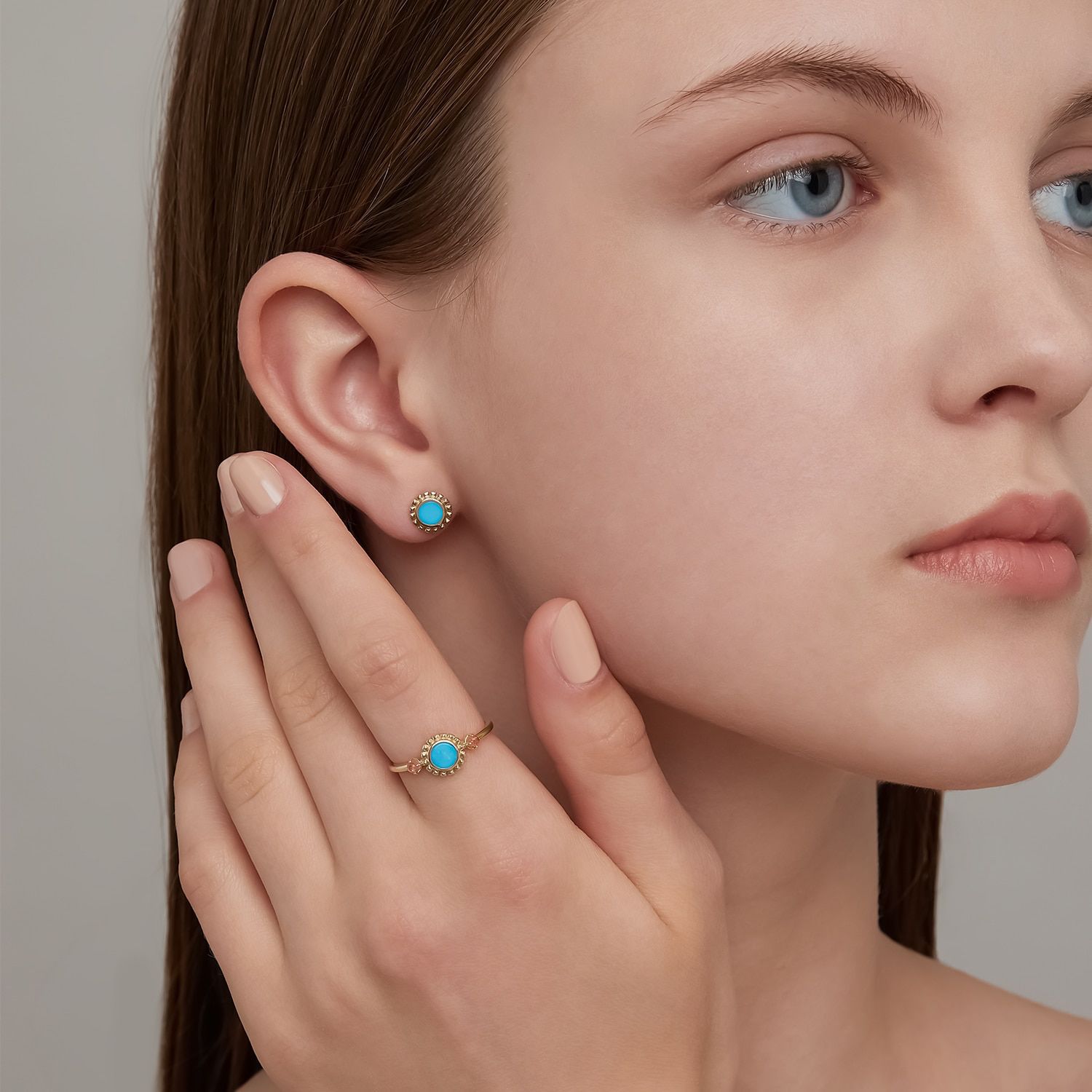 Ladies wearing turquoise and sunstone rings