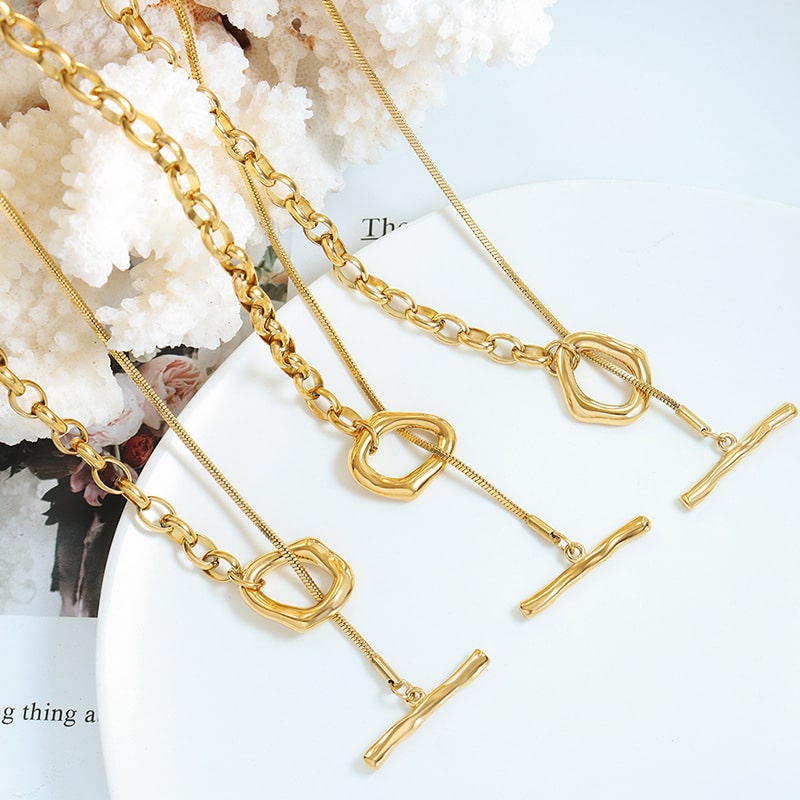 Multiple gold plated lariat necklaces